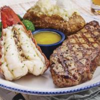 Surf & Turf Maine Lobster Tail & 12 Oz. Ny Strip** · Served with your choice of sides.. 950 Cal