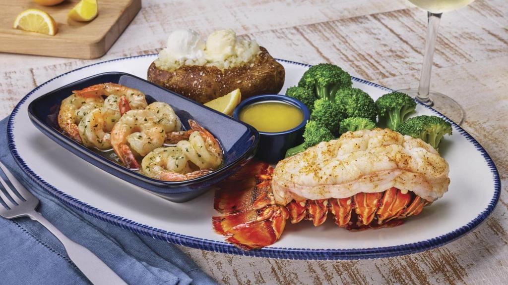 Rock Lobster & Shrimp · Roasted rock lobster tail and garlic shrimp scampi. Served with choice of sides.. 920 Cal