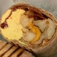 Classic Egg Wrap · Three eggs, home fries and cheddar in a wheat wrap.