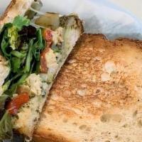 Sarah'S  Grilled Chicken Panini · Roasted red peppers, grilled chicken, grilled onions, basil pesto, spinach, Swiss and mozzar...