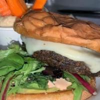 The Vegetarian · House made veggie burger, avocado, sautéed onions, lettuce, provolone and mayo. Served with ...