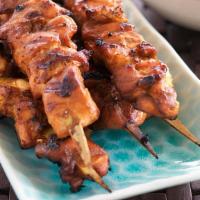 Satay Chicken (4) · Thread marinated chicken on skewers are packed full of flavor.