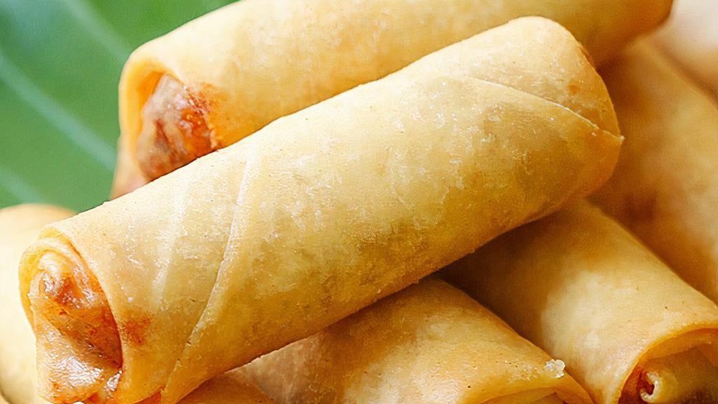 Vegetable Spring Rolls (2) · Hand-rolled with rice paper in cabbage, carrots, and celery. (Deep fried).
