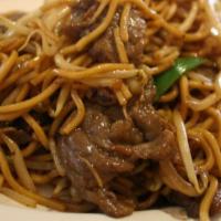 Beef Lo Mein · Egg noodle with celery scallions onions carrots and napa in soy.