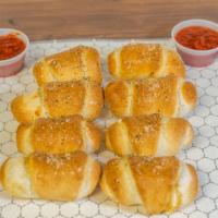 Pepperoni Rolls · Pepperoni, mozzarella and provolone rolled in dough marina sauce on side.