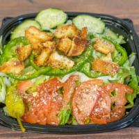 Garden Salad · Onions, tomato, green pepper, cucumbers and croutons served with a pepperoncini and dressing...