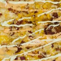 Sweet Corn With Bacon · sweet corn, bacon, crumble potato chips, mozzarella cheese. Sauces: house, pink, pineapple.