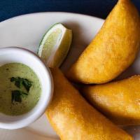  Khris Empanadas (3) · colombian style (beef or chicken). Sauces: green spicy sauce.