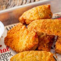 Jalapeno Poppers · Filled with cheddar cheese and served with ranch.
