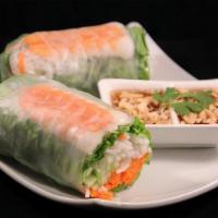 Spring Roll · Green leaf lettuce, rice noodles, cucumber, carrots, and fresh mint leaves rolled in a rice ...