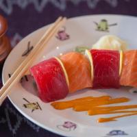 ***Rainbow Roll · California Roll topped with fresh fish. ***Served Raw. Warning, Consuming raw or undercooked...