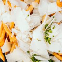 Garlic Parmesan Fries · Hand-cut fries tossed with garlic and parmesan.