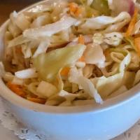 Creamy Slaw · RED & GREEN CABBAGE, RED ONION, CARROTS TOSSED IN HOUSE SLAW DRESSING