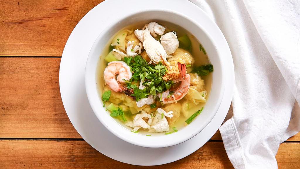 Wonton Soup · Chicken broth with hand folded chicken wontons, chicken, shrimp and baby bok choy. Topped with green onion and cilantro.