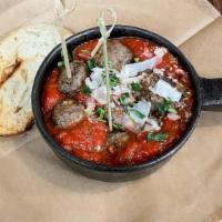 Meatballs · In-house made Beef & Lamb Meatballs served over marinara with toasted bread.
