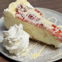 Strawberry White Chocolate Cheesecake · After Dinner indulgence...Made In house creamy cheesecake topped with velvety white chocolat...