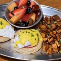 Classic Eggs Benedict · toasted English muffin, maple cured Canadian bacon, poached eggs, then topped with hollandai...