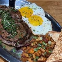El Barriga Steak N Eggs · 10oz Prime NY Strip steak, two eggs cooked to your preference, served with side of home frie...