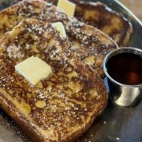 French Toast · 3 Slices of french toast topped with powdered sugar & maple syrup.