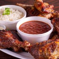 Family Meal · Whole chicken, rice, beans and a choice of two additional sides.