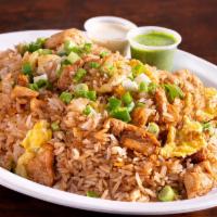 Chaufa De Pollo · Fried rice, mixed with chicken, egg, soy sauce and green onions.