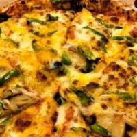 Mr. Vegilicious Pizza · Fresh mushrooms, onions, green peppers, black olives &  fresh sliced tomatoes.