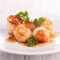 Fried Scallops · Deliciously seasoned scallops, dipped in buttermilk and tossed in seasoned flour, deep-fried...