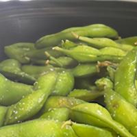Edamame · Steamed and lightly seasoned soybean pods.