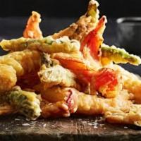 Vegetable Tempura · Lightly battered with tempura dipping sauce. served with white rice.