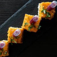 Dhokla Duo · Savory Szechwan cake with cranberry layer.