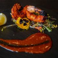 Bhatti Prawns · King prawns, celebration spices, and strawberry chili chutney.