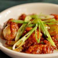 Chili Chicken · An Indo-Chinese fusion cooked chicken or paneer mixed with onions, peppers.