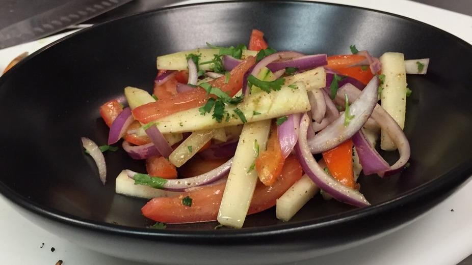 Kachumber Salad · Red onions, tomatoes, cucumber, mixed with lemon-lime vinaigrette
