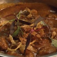 Rogan Josh Curry · Ginger, brown onion and kashmiri spice sauce with rice