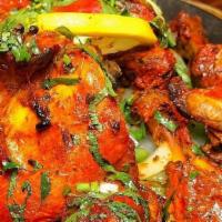 Tandoori Chicken · Marinated half spring chicken roasted in tandoor