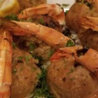 Baked Stuffed Shrimp · Baked stuffed shrimp with a buttery ritz cracker stuffing served with mashed potatoes and ve...