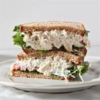 Chicken Salad Sandwich · With mayo or mustard, lettuce and tomato on wheat or white bread.