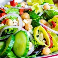 House Salad · Cherry tomatoes, roasted peppers, cucumber, garbanzo beans, red onions, Mozzarella, pepperon...