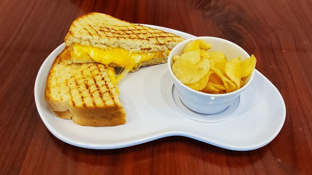 Grilled Cheese Sandwich · Made with Sourdough, American or Cheddar Cheese, Mozzarella Cheese, Provolone