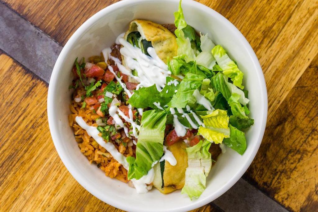 Relleno Bowl · Batter-fried cheese-stuffed pasilla chile, refried pinquito beans(not vegetarian), red rice, lettuce, crema, pico de gallo