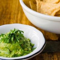 Chips, Salsas & Guac · Housemade corn tortilla chips, chipotle salsa, salsa verde & guacamole