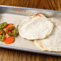 Mini-Quesadillas · Two small corn tortillas, melted jack and cheddar cheese