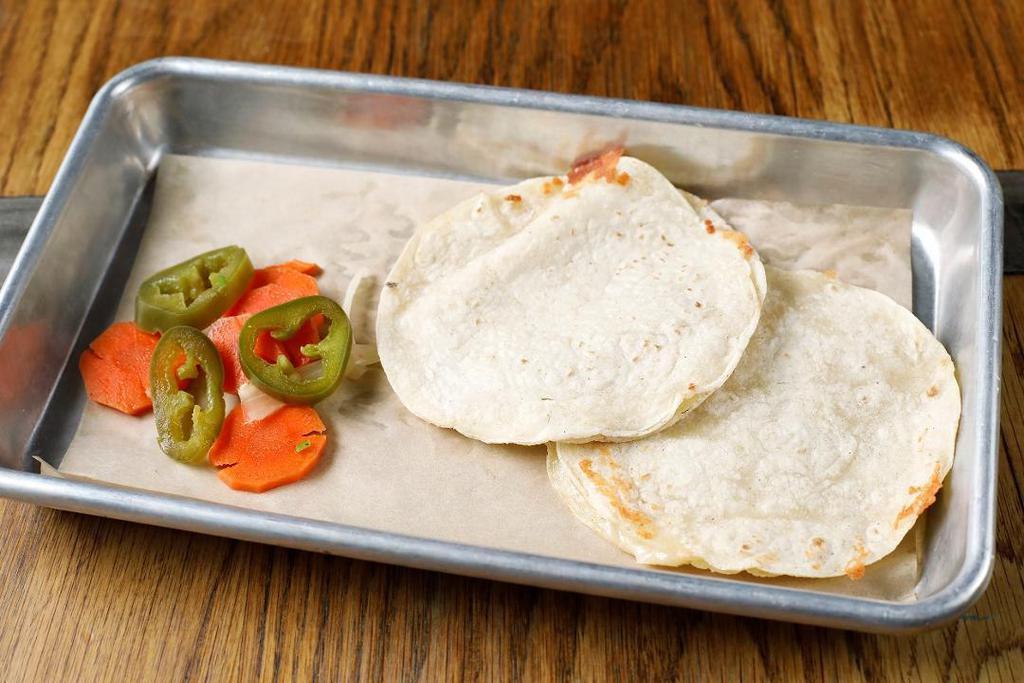 Mini-Quesadillas · Two small corn tortillas, melted jack and cheddar cheese