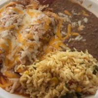 Vegetarian Enchiladas · Two corn tortillas stuffed one filled with jack and cheddar cheese and one filled with refri...