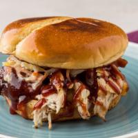 Bbq Chicken Sandwich · Chopped rotisserie chicken with BBQ sauce, pickless, and onions on Hawaiian bread.