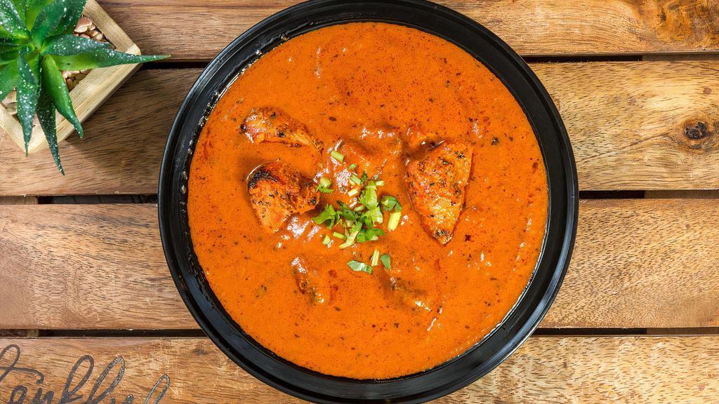Butter Chicken · Grilled chicken (Tandoori chicken) simmered in a spicy, aromatic, creamy tomato gravy (also known as Chicken Makhani)