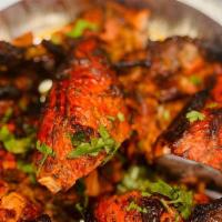 Tandoori Chicken Full · Whole chicken marinated in spiced yogurt and roasted in clay oven