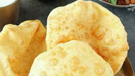 Chole Bhature · Spicy chickpea curry served with leavened fried bread