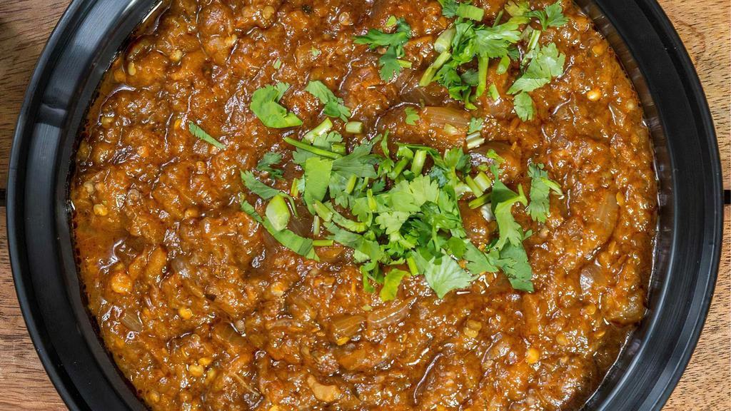 Baingan Bharta · Fire roasted eggplant mash cooked with Indian spices