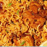 Chicken Biryani · Savory chicken and rice dish that includes layers of chicken, rice, and aromatics that are s...